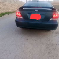 كامري موديل 2004 رقم نينوى دولي سنويه لل 30 بدون صبغ بيها بارد باب الس...