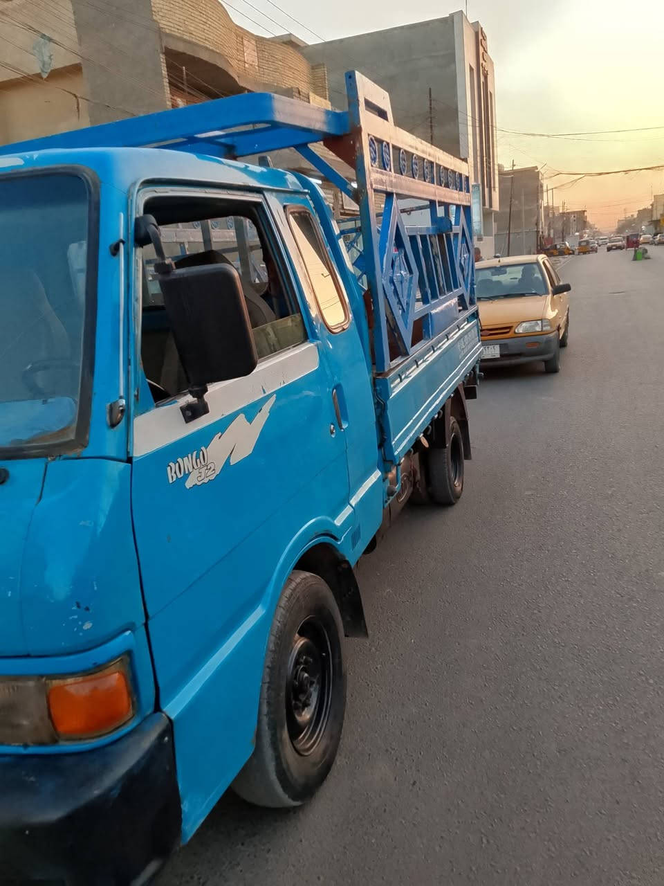كي بنكو موديل 95 رقم بغداد الماني مشروع وطني محرك كير اكسن جديد شاصي مكفول رقم شاصي شعار ومثبت بل سنويه 7جنكال صدر جديد بكانه بغداد معامل باويه رقمي ***********  السعر 54 بيه مجال
