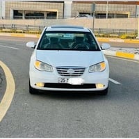 أفانتي ٢٠٠٩ • أبيض ثلجي • رقم كركوك