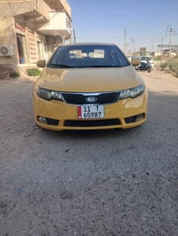 كيا سيراتو مديل 2012رقم بغداد نكليزي سنويه جديده سياره بدون حادثه محرك...