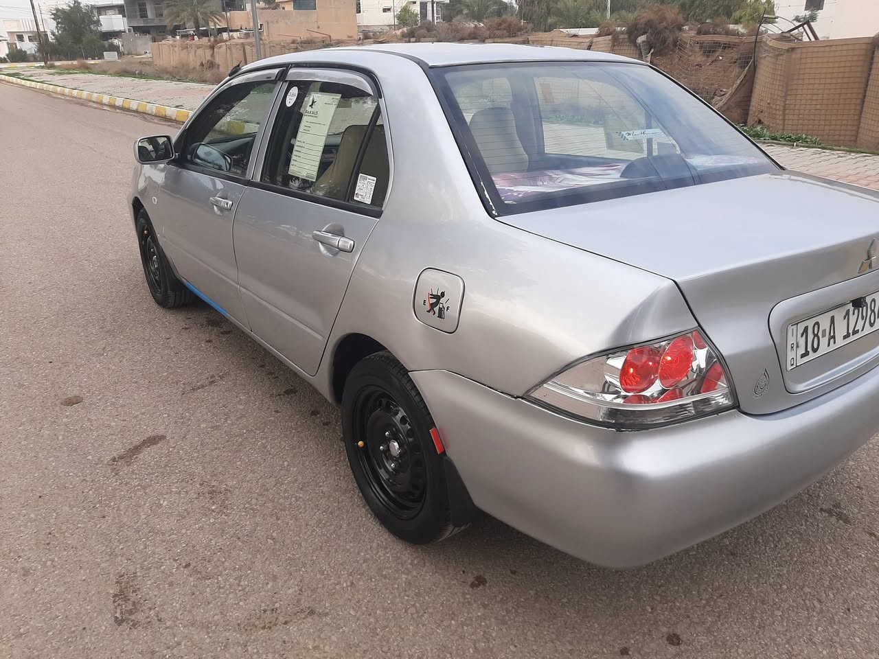 سلام عليكم لانسر ٢٠٠٦ رقم بابل انكليزي بسمي مشروع وطني مكينة 1600 قبق اسود كير مكينة شاشه كامره مكفولات جدد تبريد تدفئة شغال حدادية خير من الله سيارة  جديدة احلة من صور ستفسار ((***********)) ( السعر 58 وبيهة مجال سيارة كاملة مابيهة اي نقص مصبوغه عام جماليه فقط سيارة جديدة جديدة مكان سيارة ديالئ السلام
