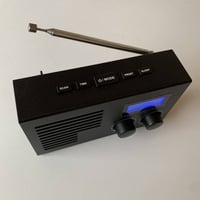 راديو • منبه • شحن وباتري