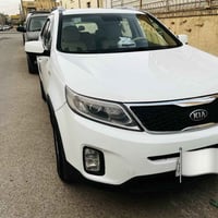 سورنتو ٢٠١٤ • ٧ راكب • محرك ٤ سلندر