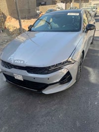 كيا/k5/ جي تي لاين موديل 2023 اللون اسمنتي وارد امريكي ماشية 52 الف بد...