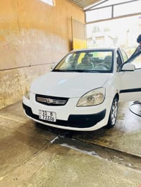 ‏سلام عليكم أبيع قسط كيا ريو  2009 سيارة باسمي محرك 14  07701679015.  ...