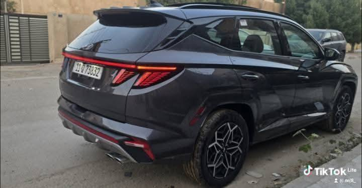 🚘 هيونداي توسان هايبرد N-Line | موديل 2024 😍
......هايبرد اقتصادي ...السعر 18900$..
🔧 حادث خفيف جدًا (صبغ ربع بنيد وربع جاملغ فقط) – بدون دواخل 🙌 صبغ بسيط كد شبرفي صندوق الخلفي...
💥 إرباك ستيرن وكشن طاك فقط..
        ⚙️ المواصفات 
⚙️ كير أوتوماتيك 8 سرعات
🕹️ شفتات ستيرن
صندوك كهرباء .فتح عند الاقتراب..
اضاءة ترحيب عند الاقتراب.
توقف ذاتي ..تحديد مسار..
🚀 تشغيل ذكي (بصمة) + تشغيل عن بُعد
📸 كاميرات دوّارة + رادار مراقبة
🎮 تحكم ستيرن كامل
🌅 فتحة سقف بانوراما كاملة
🧭 شاشة كبيرة (GPS)
🚗 رادارات 360° + حساسات أمامية وخلفية
💺 كراسي كهرباء + تدفئة المقاعد الأمامية
🔋 هاند بريك كهرباء + AUTO HOLD
🛞 مانع انزلاق + مساعد نزول المنحدرات
🔊 نظام صوت Boss الفاخر
⚡ أنظمة قيادة متعددة + نظام قيادة ذاتي
🧵 كشنات جلد فاخرة + تطريزات رياضية
🔌 منافذ USB + AUX
📏 ماشيه: 15,000 ميل فقط 😎
💰 السعر: 18900(بيع فقط) 💵
📞 للاستفسار: *********** ....
📍 الموقع: بغداد – البنوك – شارع الكنيسة بغداد, العراق
