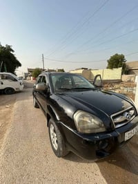 توكسان موديل 2006 أمريكي  مكينه 2700 سته سلندر جديده قبل ثلاث اشهر شدي...