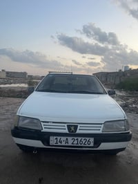 بيجو 405 • ٢٠١٠ • السنوية ٢٠٣٠