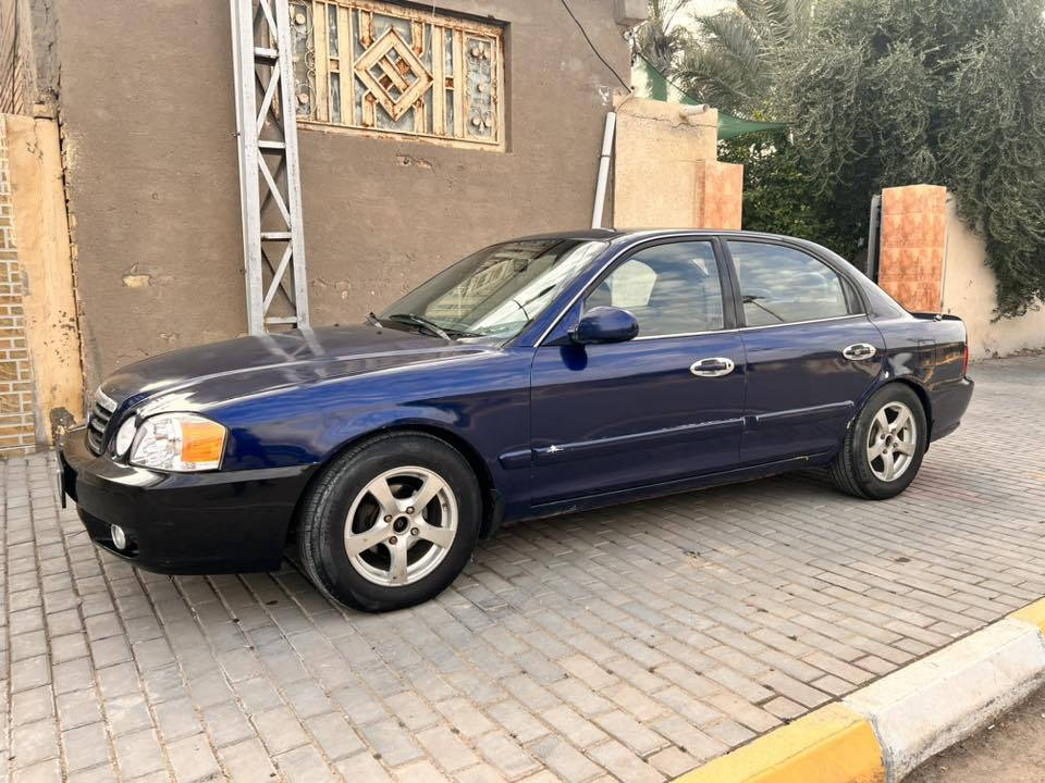 السلام عليكم 
كيا اوبتيما 2004 مصبوغة عام رقم بغداد إنكليزي ( بإسمي) 
مكينة 2000
حدادية جديدة ( خلفي أمامي) 
تخم تاير جديد 
تبريد ثلج ❄ 
دواخل نظيفة 
سيارة متخسر عليها شي
 ترايك وين متريد 
مكانها ديوانية 
السعر المطلوب 57 
*********** / ***********
