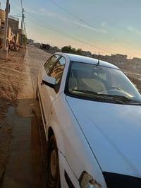 سمند موديل 11 رقم واسط انكليزي بسمي 32وبيه مجال بسيط 07827569814