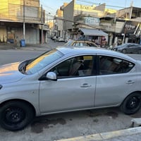 نيسان سني للبيع موديل 2023 رقم أربيل تحويل مباشر بأسمي ضررها قطعتين جا...