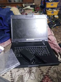 لابتوب • شاحن • ماوس