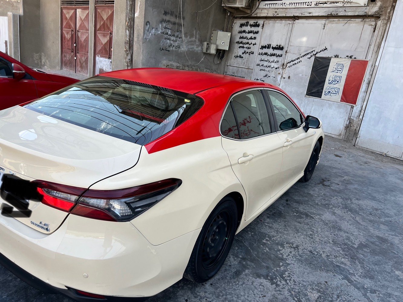 كامري موديل2023اصل السيارة مكفوله ما عده باب بي تصليح مكان السيارة بغداد الطالبيه