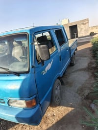كيا بنكوو 95  رقم بغداد تحويل مباشر مكينه وكير مكفولات تخم تاير  كهربا...