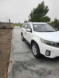 سورنتو موديل 2014 رقم بغداد انگليزي سنويه جديده محرك 2400 دكشن عالي مك...