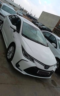 توێتا کرۆلا  2024هایبێرد سەیارەکە رەقەمە  9000 هەزار رۆشتوە  دەعامی بۆ...