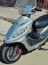 دراجه لبيع رقم لتصال 07723012192 ب450بيه مجال  كامكو في تو موديل 13  د...