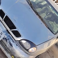 دايو الانوس للبيع  سيارة نظيفة ما ناقصها شي موديل 99 كير عادي   رقم ان...
