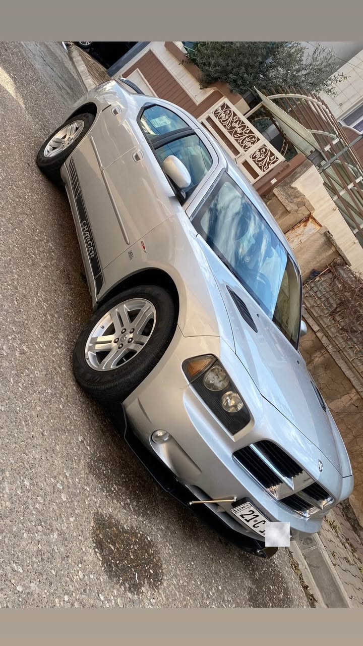 جارجر للبيع موديل 2010 مواصفات sxt رقم جديد سليمانية دولي سنوية بسمي لحد 2027 مكينة ٦ سلندر ٣٥٠٠ اصل هزة جديد ماشية ١٦٥ سيارة استخدام شخصي ما مشتغل خط بيها كوبون بانزين بسمي كير ومكينة خير من الله شرط ممفتوح نظام abs دواخل سيارة بالجيس كشنات جلد و تحكم كهرباء تبريد قطعتين ثلج كهربائيات كله شغال و مملعوب بي كله ع بلاد … سيارة عليه ادامة كامل من نوزلات و بلكات و حساس صالنصة و مجاول و بطارية و فيت بم  وبنزات فلنجات تفسيخ بيدي شديتهن  .. شواصي و بدنة و سقف و ايرباك كلها مكفولات شرط .… سيارة بيها بخ ٣ قطع و نص بدون معجون و بدون تعديل شرط سيارة قطرة معجون ما بيها شرط راسلني خاص ادزلك ورقة فحص … سيارة جاهزة ما تعبانه متصرف عليها ربع و نصبتها تخبل .. 
سعر ١٢٠ و بي مجال قليل .. رجاءا اخوان ما عاجبك السعر اعبر المنشور كلشي موجود ب سوك حسب النظافة كلشي و سعره …. عنواني كركوك 
رقم موبايل *********** واتس اب كركوك, العراق
