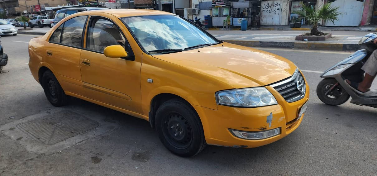 السلام عليكم نيسان سني 2009 خليجي تكسي اصل ابيض لسعر 75$ مكان بغداد التاجيات ***********
