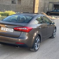 كيا سيراتو 2015  مكفوله من لصبغ والحادث فقط بارد باب وره لسايق   محرك ...