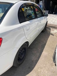 كيا ريو للبيع كابون بيها كابون  رقم جديد محرك 16 بيها بابين وجاملغ  بد...