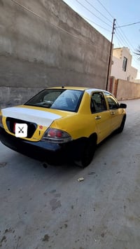 لانسر ٢٠١٠ • مكينة تبخر • رقم ديالى