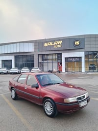 فيكترا ١٩٩٠ • مكينة ١.٨ • جير عادي