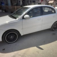 للبيع سياره كيه ريو موديل ٢٠١٢ مكينه ١٦٠٠ بيه قطعتين سعره ٧٢ ورقه وبيه...