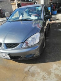 لانسر ٢٠٠٧ • صبغ • رقم قادسيه