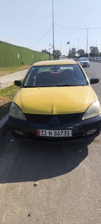 لانسر موديل 10 للبيع سعره 65 وبيهه مجال حك جيه مكان السياره بغداد هاذه...