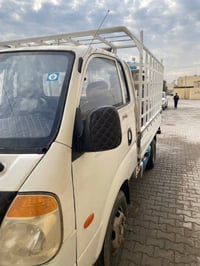 كيا حمل 2007 مكينه 2700 السيارة كفالة عامة بس الباب السائق مبدل عنواني...