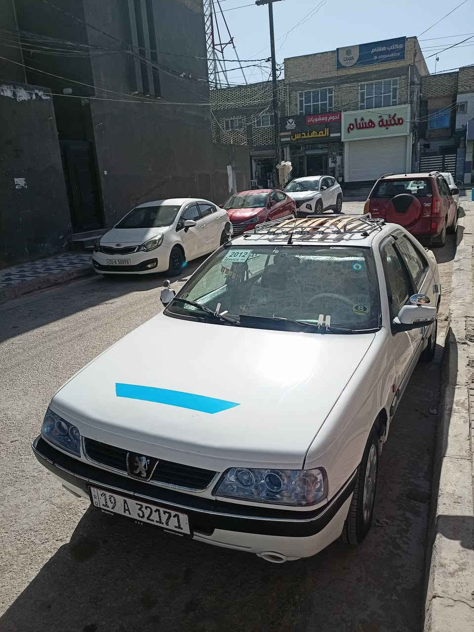 بيجو للبيع سياره جاهزه من كلشي ما بيه اي نقص معمره عالاخير كلشي شغال بيه محرك وكير وحداديه فول ومكفولات سياره احله من الصوره ومجمبزه وبيه شلعه تشك الگاع غرفه كلش حلوه وشاشه اصليه ما تذب عليه ولا ربع السعر 39 وبيها مجال السياره تسوه اكثر من هذه السعر الشراي يتصل ويدلل *********** مكان السياره نجف الكوفه
