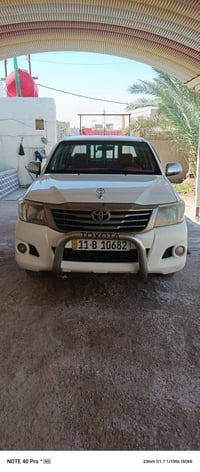 بيك اب للبيع   تويوتا هايلكس   موديل 2012  رقم بغداد انكليزي   اوتومات...