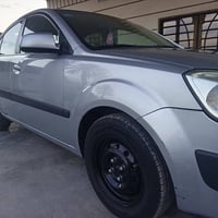 وبركاته للبيع فقط كيا ريو موديل 2009خليجية رقم بغداد انكليزي بأسمي الس...