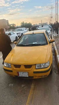 سمند ناطق 2011 مكفولة بيها فقط ضربه خفيفه بالباب الي وره السايق وموجود...