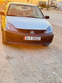 لانسر 2010 • مكينة 1600 • رقم ديالى