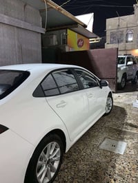 كورلا هايبرد ٢٠٢٥ ماشيه٤٧٠٠ رقم بغداد  07860099611