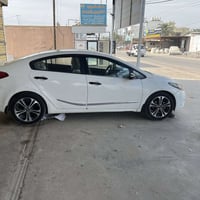 كيا سيراتو ٢٠١٤ خليجي  مطلوب مرواس موستنك او كماره ١٤ او ١٥ عنوان بغدا...