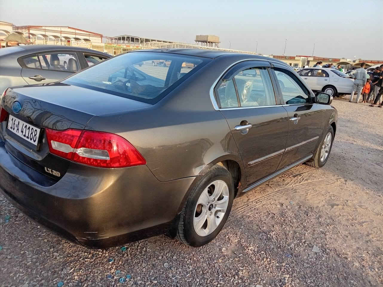 سلام عليكم سياره كيه اوبتيما لوتز2009 رقم قاسيه انكليزي بسمي سياره كفاله من ضربه وصبغ بيه جراد بلقماره ولبنيد مكينه 2000 دوش عنوان سياره بصره رقم الهاتف *********** السعر 98بيه مجال قليل
