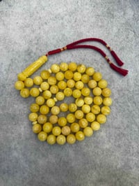 مسباح كهرب حر • ٦٦ خرزة • ٩٧ غرام