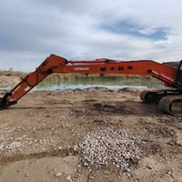 جب حفاره هيتاشي للبيع بلادي الطول ١٤ متر 07728625845