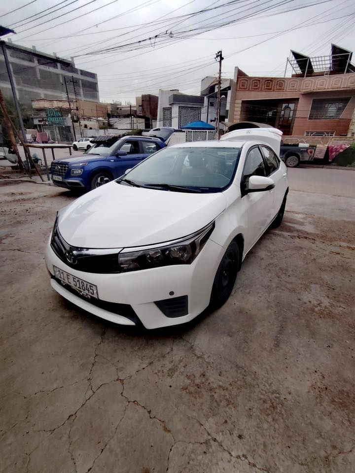 كورلا موديل 2015 مكفولة من الصبغ والتبديل كير مكينة كفالة داخل بيجي دوشمة عامة تخم تاير جديد مكان السيارة بغداد ***********
