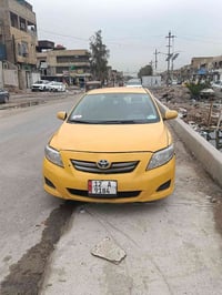 سياره كورولا 2009 رقم انجليزي مشروع وطني سعر 55 07726887505