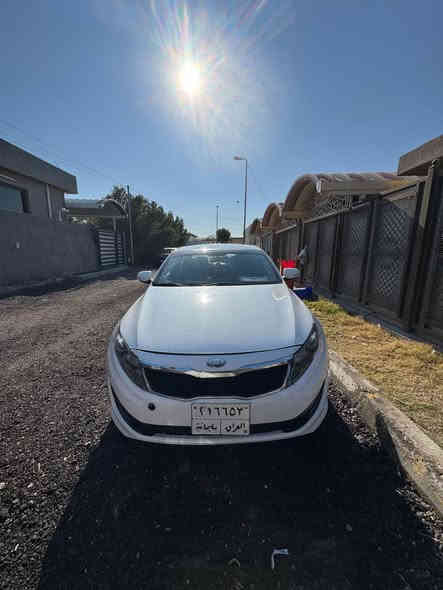 كيا اوبتما 2013 خليجي مكينة 2400 جديدة و مكفوله هيه و الگير و الكهربائيات كلشي بيهه سليم فول عدا البانوراما بيهه قطعة مصلحة نفسهه و قطعة كلير شبر واحد مشتغليهه بلادي شواصي لغود و الايرباكات مكفولات مواصفاتهة :

اشاير بالمري ...
شفتات سرعة ...
تحكمات ستيرن و 3 انظمة قيادة ...
ثلاجة بالچكمچة ...
ويل 16 گادنزا اصلي ...
شاشة اندرويد تجاري لان متجي بيهه شاشة ...
سستم صوت اصلي...
و باقي التفاصيل و الشرح بالفيديو اسف على الاطالة 
 السعر:_ 122 
مكاني بغداد ( مطار بغداد الدولي) 
رقم الهاتف ***********
و للعلم الليمونه متجي ويه السيارة بدون احراج 😂
