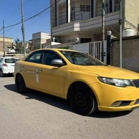 كيا فورتي موديل 2012 رقم بغداد السيارة بأسمي مصفرة هيئة وغرامات محرك 2...