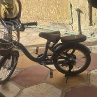 السلام ع بايسكل حجم 14 اسباني اصلي جديد لوك عمر 5او6 سنه مبايل 0774042...
