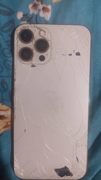 آيفون ١٢ برو ماكس • بطارية اصلية • ظهر مكسور