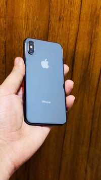 iPhone X 256 اسود بطاريته 100  كلشي شغال بي ع فحص عدا البصمه  مكاني بغ...