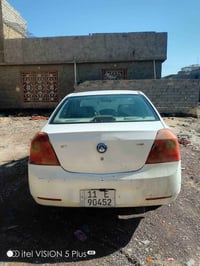 جيلي MK • باسمي • رقم بغداد